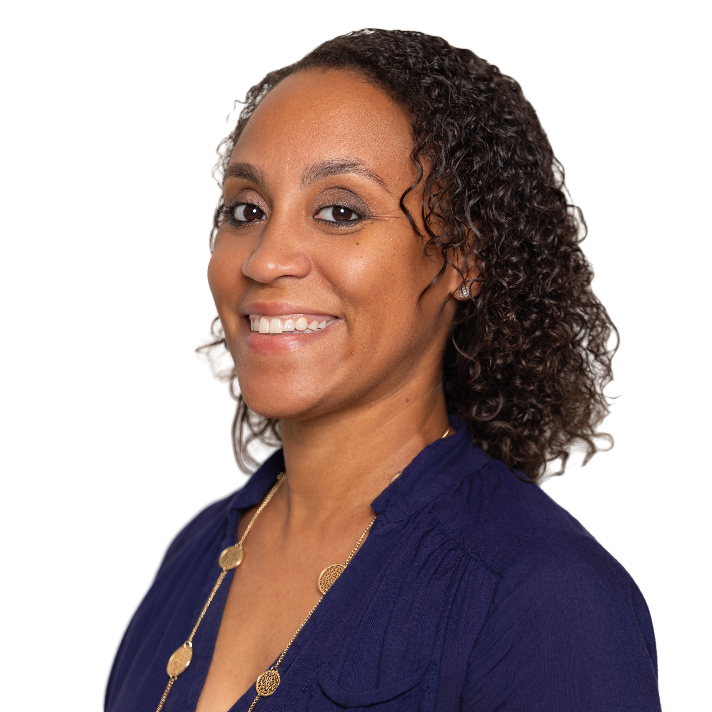 Confident Black business professional in a clean studio portrait